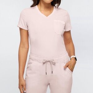JAANUU WOMEN'S 2-POCKET TUCK-IN TOP - Blushing Pink